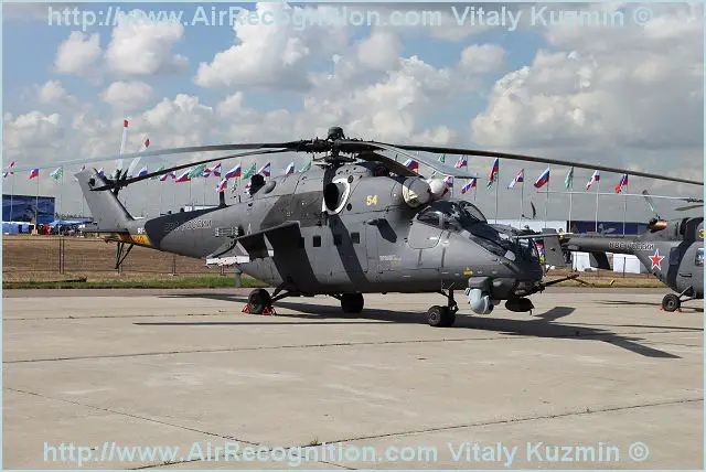 Iraq took collection Thursday night of the first four Russian-made Mi-35 helicopter gunships sold to the Middle Eastern nation as part of a multibillion dollar weapons deal.