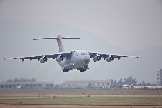 China's first domestically developed strategic air lifter, the Y-20 Kunpeng, made its first public appearance at Airshow China 2014, which was held at Zhuhai last week. The Y-20 airlifter will soon be delivered to users, a senior aviation executive said, adding that the development of its engine is "faring well".