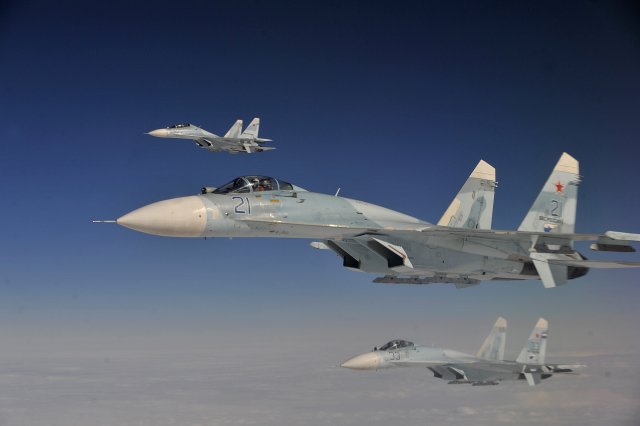 Over 50 Russian fighter jet pilots are taking part in the exercises, which will culminate with the Ladoga-2015 exercise over Lake Ladoga, east of the outskirts of St. Petersburg. Russian fighter jets will shoot live ammunition and launch guided missiles in combat environments as part of planned exercises that began on Tuesday in the northwest of the country, the head of the Western Military District's press service, Colonel Oleg Kochetkov announced. 
