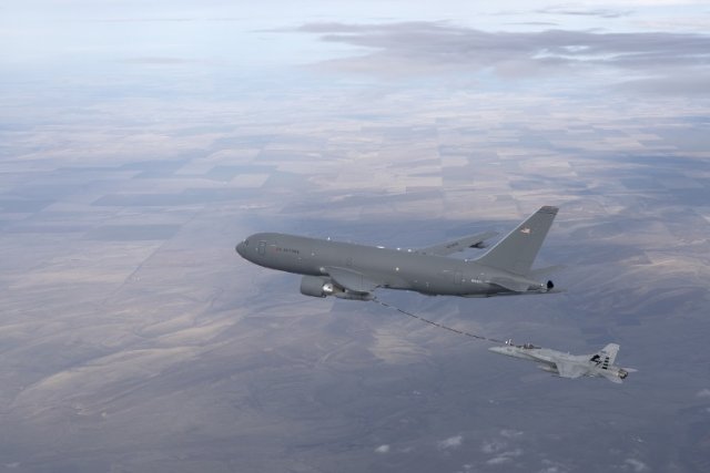 USAF KC 46 tanker completes first in flight refueling with F A 18 fighter aircraft 640 001