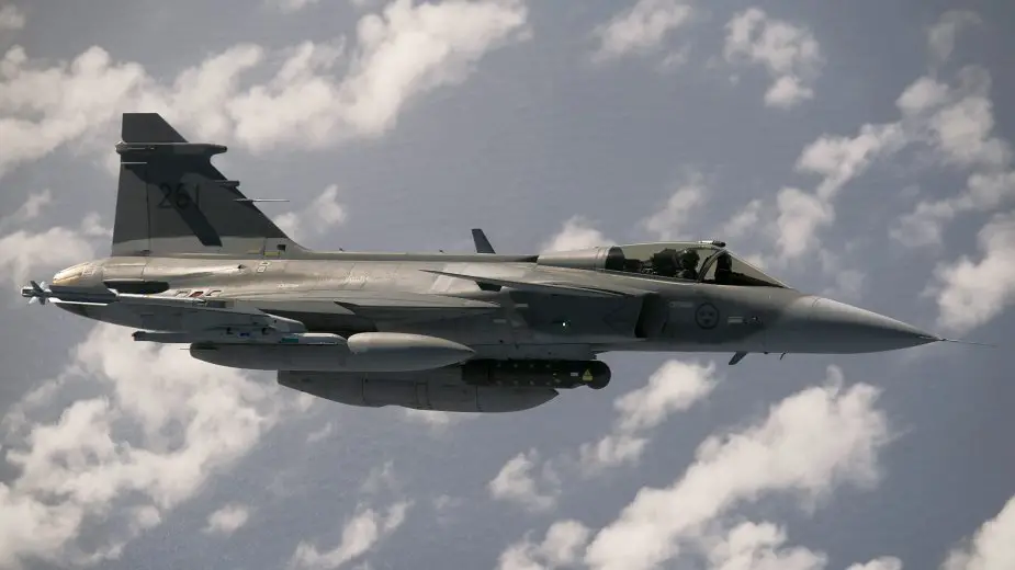 Saab JAS 39C Gripen of Swedish Air Force dropped 500 lbs bomb on forest fire