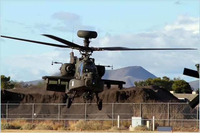 Chief Warrant Officer 2 Shawn Witt lifts off in an AH-64D Apache Block III helicopter from Boeing's flight line in Mesa, Ariz.